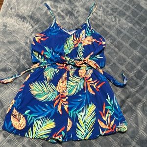 Express blue tropical floral romper. Size medium. Has some stretch to it